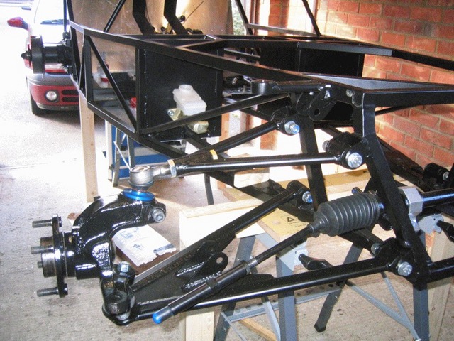 Description First fitting of front wishbones